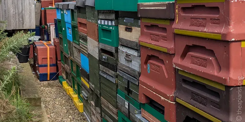 Bee hives stacked up in storage